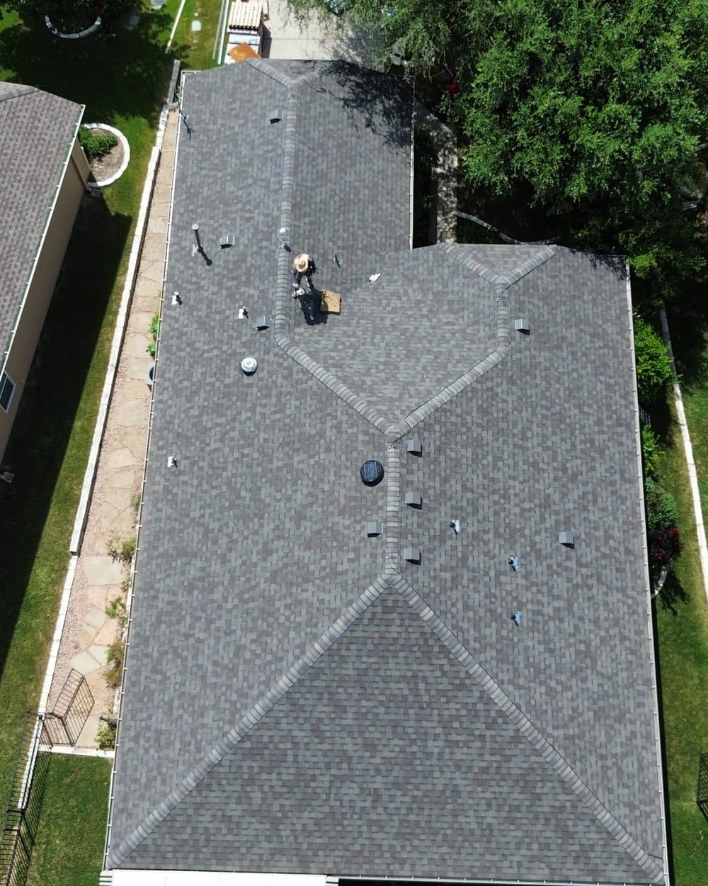 Residential Roof Replacement Round Rock TX | Helix Roofing LLC Residential roof replacement Round Rock TX, new asphalt shingle roof installed by Helix Roofing LLC, roofing company serving Round Rock and Greater Austin